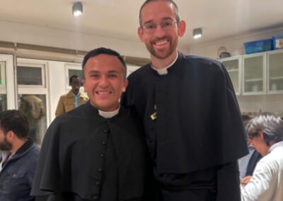 Rev. Pedro Jose Carreno Median and Rev. Zachary Rathke pose for a picture at an anniversary celebration of Nuestra Señora de Santa Cruz (Our Lady of Holy Cross) Chapel