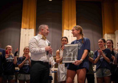 Pictured is Rosie Binette receiving the 1st Ocean Leto award at the University of Notre Dame boxing event.