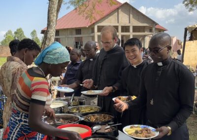 Pictured is Br. Jordan Chang, C.S.C., at a barbacue celebration at Brother André Hospital in Kenya.