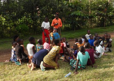 Students and educators gathered outdoors at Eden Academy in Utegi, Tanzania