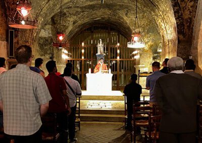 Group of men celebrating Mass at the Final Vows program in Le Mans, France.