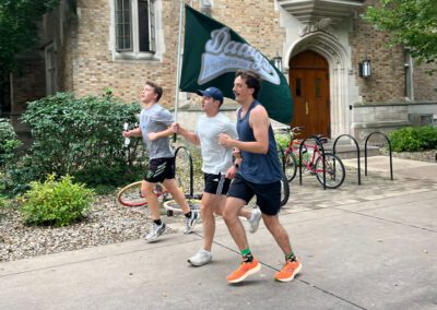 Men running at Alumni Hall at the University of Notre Dame held their “5th First Annual Dog Jog” on South Quad