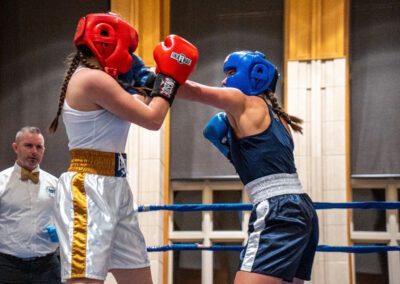 Two female University of Notre Dame students sparring in a boxing ring during practice for the 2026 Baraka Bouts