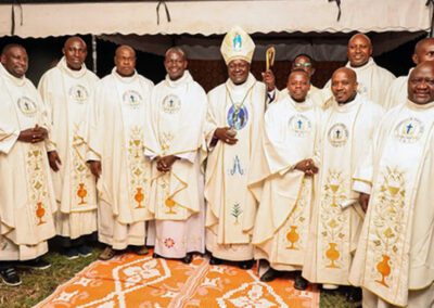 Group picture of Holy Cross religious with The Most Rev. John Obala Owaa, Bishop of the Diocese of Ngong, at the new Holy Cross Center Kiserian in Nairobi, Kenya.