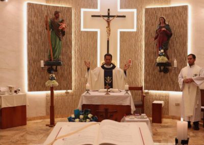 Rev. Jim Gutierrez, C.S.C., stands at the altar in the newly renovated chapel at Casa San José (Saint Joseph House of Formation) in Canto Grande, Peru